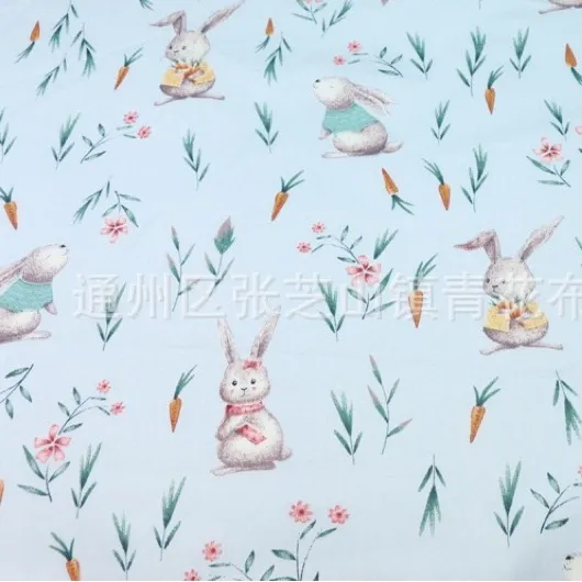 ผ้าคอตตอน 100% ทอทวิล หน้ากว้าง1.6 เมตร ผ้าเมตร พิมพ์ลายดอกไม้ ผ้าลายการ์ตูน ลายกระต่ายแครอทพื้นฟ้า