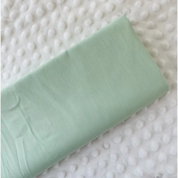 ผ้าคอตตอน 100% ทอทวิล หน้ากว้าง 2.5 เมตร สีพื้น เหมาะกับนำไปทำผ้าปูที่นอน ลายผ้าbgสีเขียวมิ้น-311