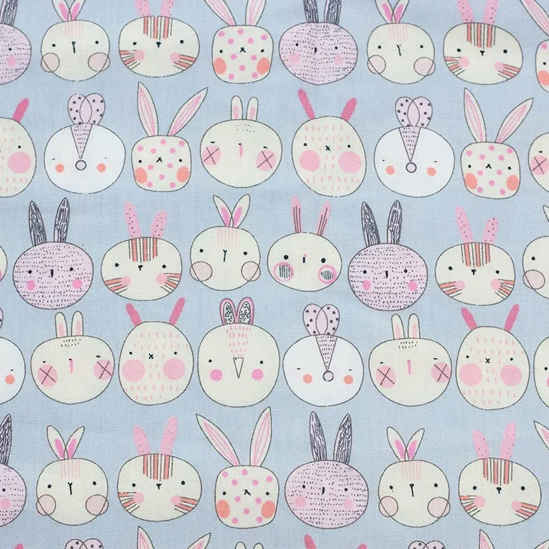 ผ้าคอตตอน poplin พิมพ์ลายดอกไม้ ลายกระต่าย ข้าวปั้น ลายกระต่ายpoplinฟ้า-326