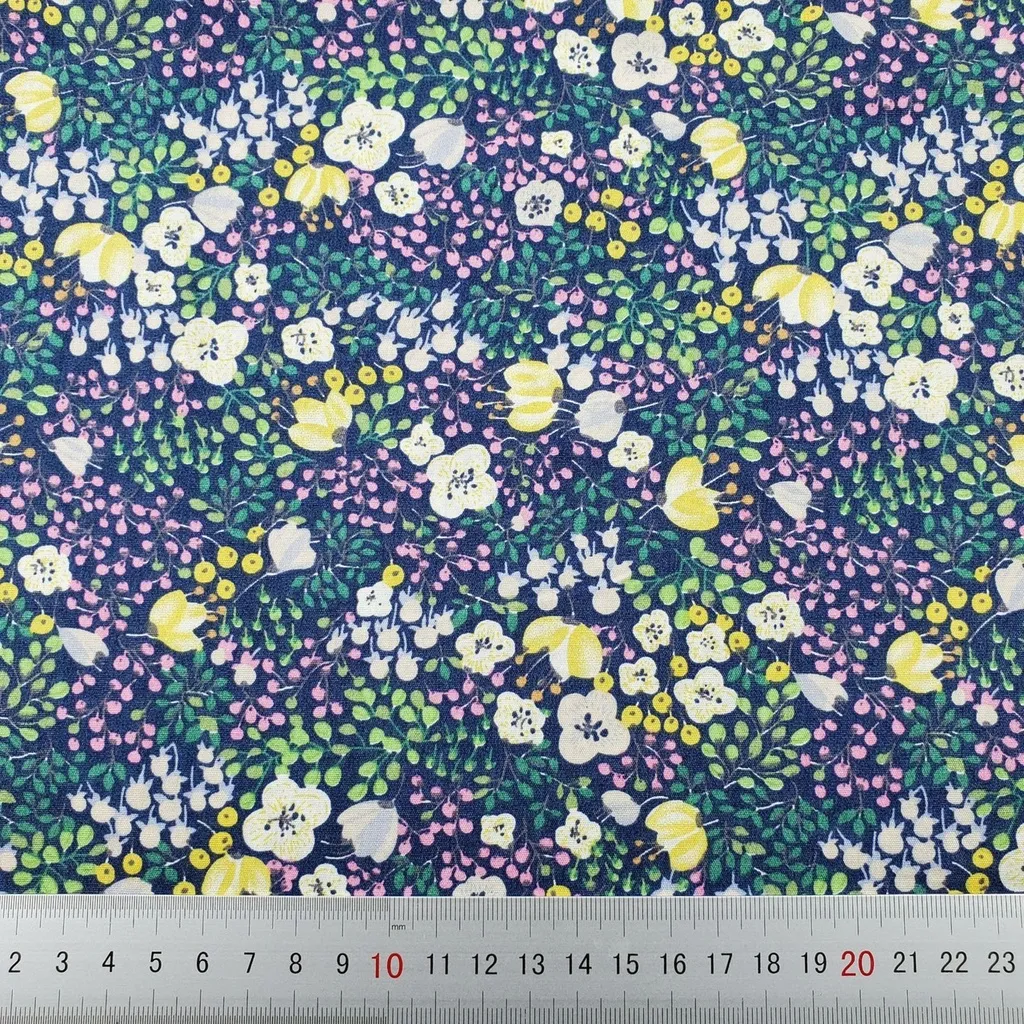 ผ้าคอตตอน poplin พิมพ์ลายดอกไม้ ลายกระต่าย ข้าวปั้น ลายดอกเหลืองพื้นกรม-419