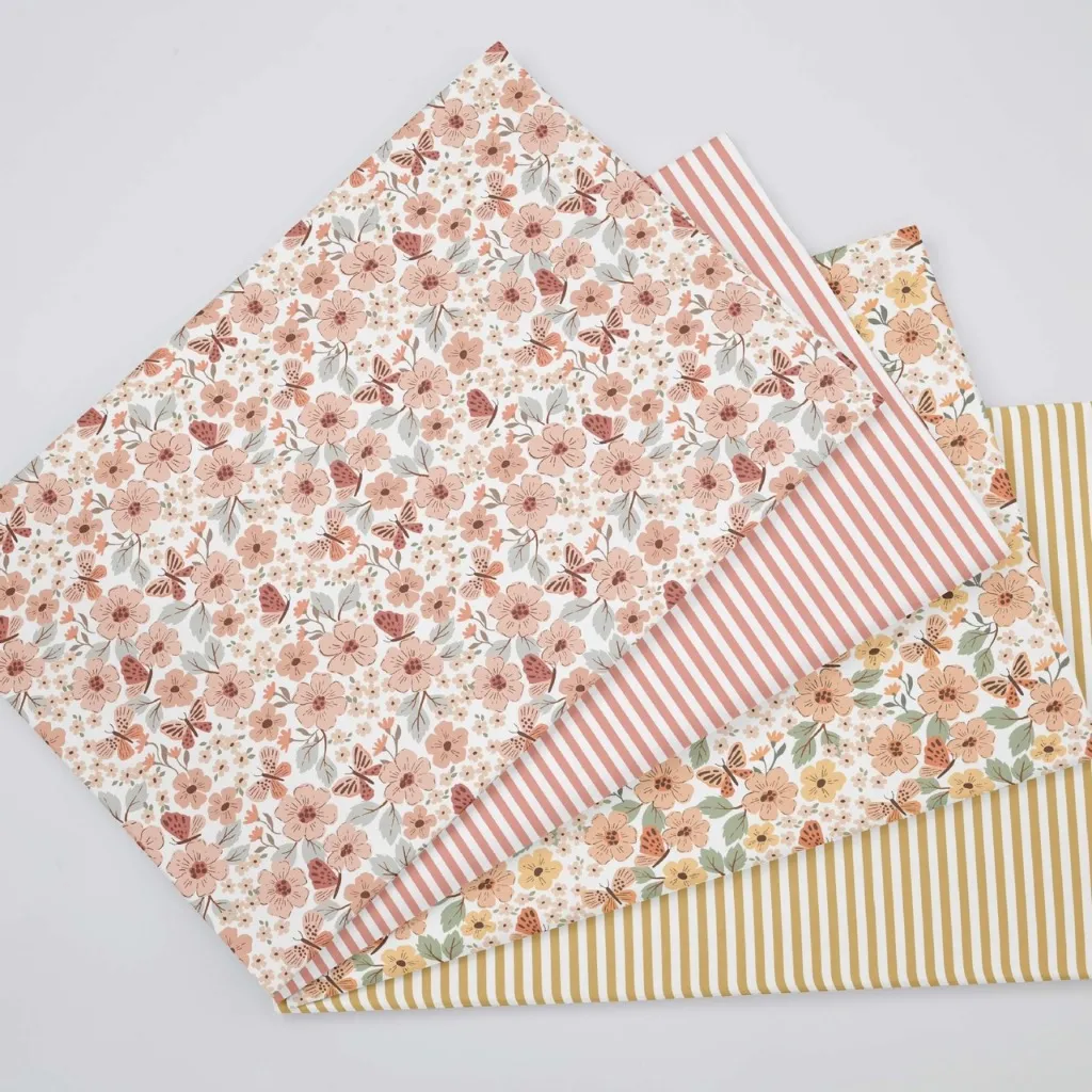 ผ้าคอตตอน 100% ทอทวิล ผ้าเมตร พิมพ์ลายดอกไม้กับผีเสื้อ หน้ากว้าง 1.6 เมตร