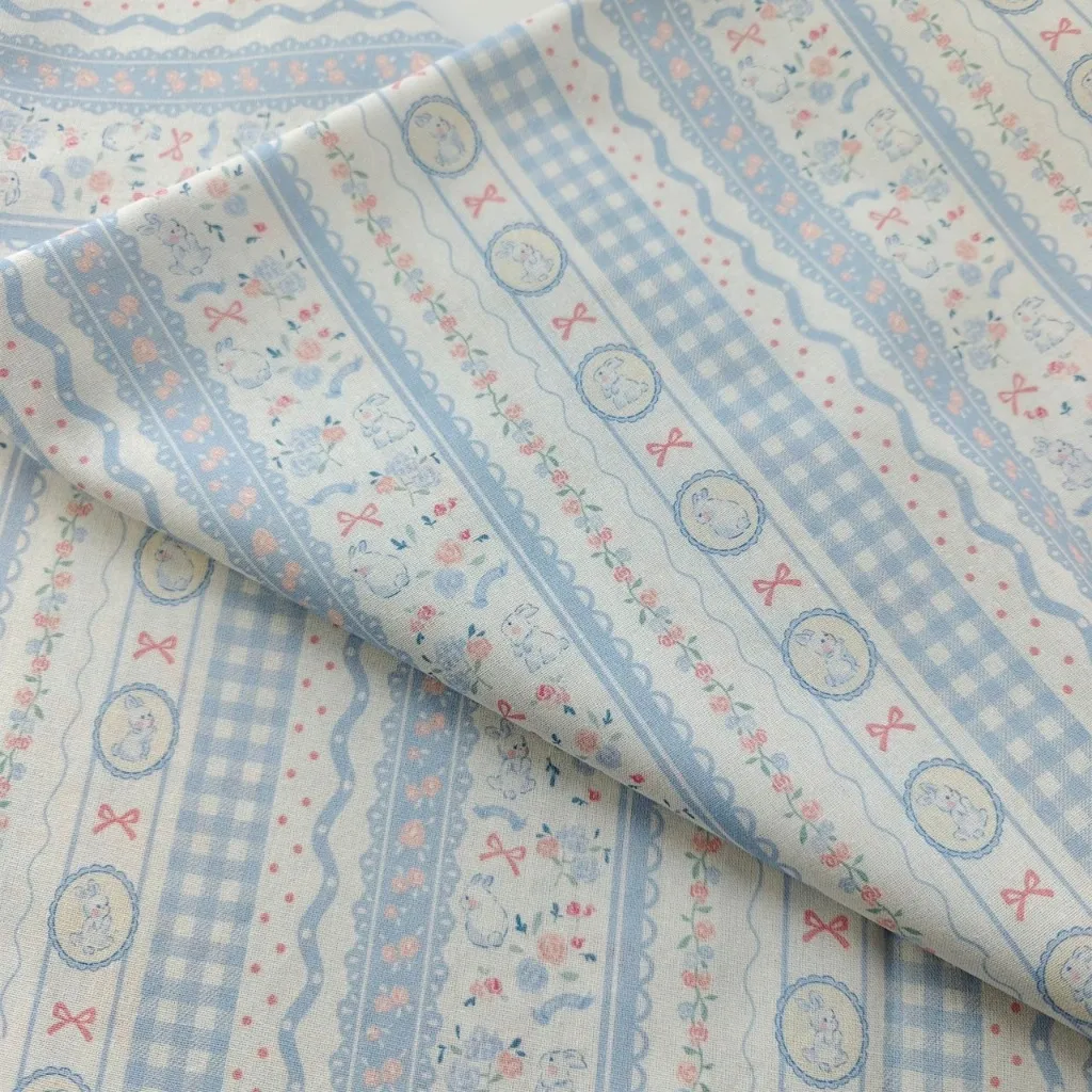 ผ้าคอตตอน 100% cotton poplin  ตัดขายเป็นเมตร หน้ากว้าง 145 เซนติเมตร ลาย Rabbit bow flower รูปที่ 3