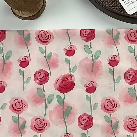 ผ้าคอตตอน 100% cotton poplin  ตัดขายเป็นเมตร หน้ากว้าง 145 เซนติเมตร ลายกุหลาบแดงพื้นชมพู รูปที่ 4